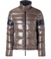 A sleek patina and cool contrast paneling lend this Duvetica down jacket its sporty and stylish edge - Wind- and water-resistant taupe and black polyamide, two-way front zip, stand-up collar with snap closures, side slit pockets - Straight cut fits close to the body for extra warmth - Pair with jeans, chinos, cords and athletic pants