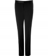 Amp up your cocktail party look with these modernized tuxedo pants from D&G Dolce & Gabbana -Classic tuxedo styling, slim fit, front crease detail, side satin trim, off-seam pockets, back welt pockets with button - Pair with a matching jacket for a formal look or with a blazer and a button down