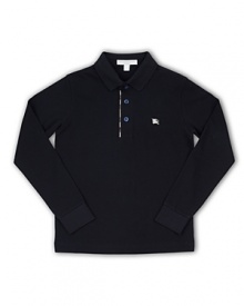 Boasting a classic color and a hint of the brand's classic check on the interior placket, this Burberry polo shirt was made with sophisticated little ones in mind. Boasting a classic color and a hint of the brand's classic check on the interior placket, this Burberry polo shirt was made with sophisticated little ones in mind.