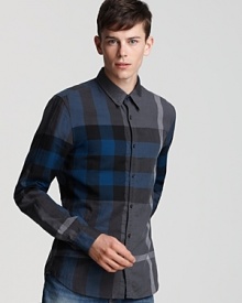 Burberry's larger-than-life check pattern makes an iconic statement on this modern, slim-fitting sport shirt. Burberry's larger-than-life check pattern makes an iconic statement on this modern, slim-fitting sport shirt.