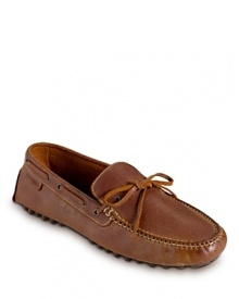 A road-worthy driving shoe with handsewn detail, a flexible fit and a traditional rubber nub sole. A road-worthy driving shoe with handsewn detail, a flexible fit and a traditional rubber nub sole.