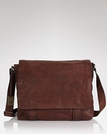 Frye loves the rugged look, and so do we. The classic messenger bag is rendered in distressed leather for a cool, road-tested look and feel. Frye loves the rugged look, and so do we. The classic messenger bag is rendered in distressed leather for a cool, road-tested look and feel.