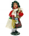 A little girl finds baubles to fill stockings and trim the tree, all while singing beloved holiday carols. An adorable figurine from the Bearing Gifts family, with the handcrafted charm of Byers' Choice.