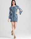 Split sleeves lend a bohemian look to Laundry by Shelli Segal's printed dress--an exposed zip front boasts dramatic flair.