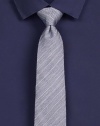 Diagonal striped herringbone tie rendered in an elegant blend of superior Italian wool and silk.About 3 wide68% wool/32% silkDry cleanMade in USA