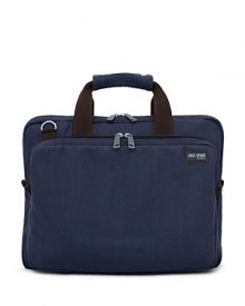 Take the world by storm when you carry this handsome brief by Jack Spade, designed to hold all your critical workday essentials. Take the world by storm when you carry this handsome brief by Jack Spade, designed to hold all your critical workday essentials.