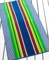 Preppy, multi-colored stripes offer a polished look in this Pacific Stripe beach towel from Lauren by Ralph Lauren. Features the Ralph Lauren logo in the corner.