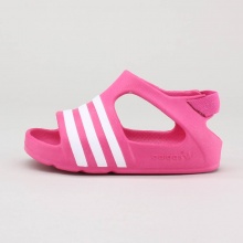 Give your little one the legendary comfort of the adidas Originals adilette Play sandals. This toddler-sized sandal features a single-piece molded EVA upper with flex lines in the outsole for safer traction. Give your little one the legendary comfort of the adidas Originals adilette Play sandals. This toddler-sized sandal features a single-piece molded EVA upper with flex lines in the outsole for safer traction.