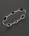 From the Rock Candy® collection, eight stone stations in onyx on a sterling silver bangle. Designed by Ippolita.