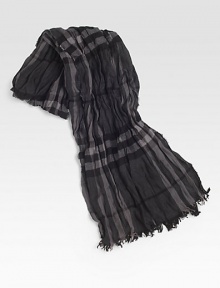 Elegant blend of super-soft wool and cashmere in a classic iconic check pattern with fringed edges.Fringed endsWool/cashmere12W x 74HDry cleanMade in Great Britain Elegant blend of super-soft wool and cashmere in a classic iconic check pattern with fringed edges.Fringed endsWool/cashmere12W x 74HDry cleanMade in Great Britain