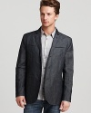 Innovation at its finest - a sport coat that converts effortlessly to a military jacket with the simple fold of the lapel and collar. Designed with 4 besom pockets for a sleek front, John Varvatos Star USA doubles down on coolness and achieves a supremely fresh, utterly versatile look for the season.