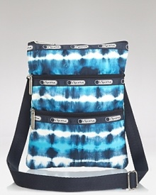 LeSportsac's latest crossbody features a vibrant print and plenty of pockets, sure to add a on-trend pop when you're darting around town. LeSportsac's latest crossbody features a vibrant print and plenty of pockets, sure to add a on-trend pop when you're darting around town.