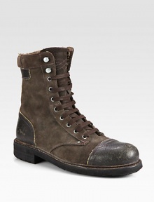 A distressed leather captoe and heel lends the finishing touch to this suede lace-up ankle boot.Suede/leather upperLeather/fleece liningPadded insoleRubber soleImported A distressed leather captoe and heel lends the finishing touch to this suede lace-up ankle boot.Suede/leather upperLeather/fleece liningPadded insoleRubber soleImported