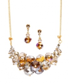 A bright pop of color. Take on the latest trend in c.A.K.e. by Ali Khan's bubbly style. Champagne-colored faceted glass stones combine for a totally chic look. Set in gold tone mixed metal. Approximate length: 16 inches + 2-inch extender. Approximate drop length: 1-1/2 inches. Approximate drop width: 2 inches. Approximate earring drop: 3/4 inch. A bright pop of color. Take on the latest trend in c.A.K.e. by Ali Khan's bubbly style. Champagne-colored faceted glass stones combine for a totally chic look. Set in gold tone mixed metal. Approximate length: 16 inches + 2-inch extender. Approximate drop length: 1-1/2 inches. Approximate drop width: 2 inches. Approximate earring drop: 3/4 inch.