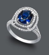 Class and sophistication come easy in this regal, Effy Collection style. An oval-shaped ring highlights a brilliant sapphire (1-9/10 ct. t.w.) surrounded by double rings of sparkling diamonds (1/3 ct. t.w.). Set in 14k white gold.