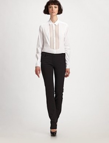 THE LOOKButton closure at collarButton-down placketSheer silk tuxedo-style pintucked frontLong sleeves with button cuffsCurved hemTHE FITAbout 26 from shoulder to hemTHE MATERIAL68% cotton/27% nylon/5% spandexSilk contrastCARE & ORIGINDry cleanImported