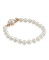 Simple, yet stunning. This white glass pearl (6 mm) bracelet by Carolee is a must-have for every accessory collection. Set in 12k gold-plated mixed metal. Approximate length: 7-1/4 inches.