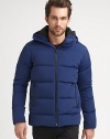 A sleek quilted design is enhanced by a smooth finish featuring an attached hood for added warmth and style.Zip frontStand collarAttached hoodSide zip pocketsAbout 29 from shoulder to hemPolyesterDry cleanImported