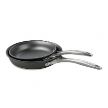 Each pan in this nonstick set boasts two indispensable surfaces: one ultra-smooth surface that releases foods effortlessly and a specially-textured sear surface that seals in flavor. But the best part? The nonstick surface is so effective you can cook with little to no butter or oil, limiting fat intake for healthier dishes. Each pan in this nonstick set boasts two indispensable surfaces: one ultra-smooth surface that releases foods effortlessly and a specially-textured sear surface that seals in flavor. But the best part? The nonstick surface is so effective you can cook with little to no butter or oil, limiting fat intake for healthier dishes.