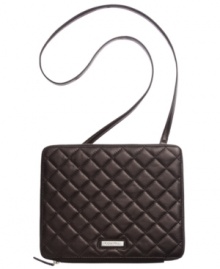 On the go? Keep you digital device in check with this travel-ready iPad case from Calvin Klein. Crafted in rich leather with padded interior and convenient crossbody strap, it's totally tech-friendly. On the go? Keep you digital device in check with this travel-ready iPad case from Calvin Klein. Crafted in rich leather with padded interior and convenient crossbody strap, it's totally tech-friendly.