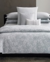 A garden of earthly delights. The Laurel duvet cover set from Calvin Klein offers a fresh take on natural sophistication with a yarn-dyed jacquard of overlaid woven flowers in cool, soothing tones. Featuring hidden button closure; reverses to self.