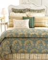 Bring the signature look of Court of Versailles into your room with this La Caravane decorative pillow. Featuring gold French script embellished with quill embroidery at center for a timeless, luxurious appeal.