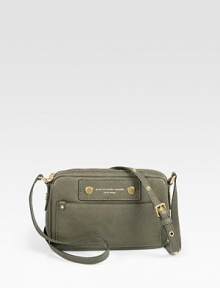 A compact, ultra-protective shape made of buttery smooth leather. Adjustable shoulder strap, 18-22 dropTop zip closureOne outside open pocketOne inside zip pocketTwo inside open pocketsFully lined9W X 6H X 1½DImported A compact, ultra-protective shape made of buttery smooth leather. Adjustable shoulder strap, 18-22 dropTop zip closureOne outside open pocketOne inside zip pocketTwo inside open pocketsFully lined9W X 6H X 1½DImported