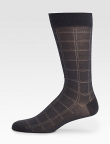 Featuring a timeless windowpane print, pima cotton socks with a touch of stretch.Mid-calf height75% pima cotton/25% polyamideMachine washMade in Italy Featuring a timeless windowpane print, pima cotton socks with a touch of stretch.Mid-calf height75% pima cotton/25% polyamideMachine washMade in Italy