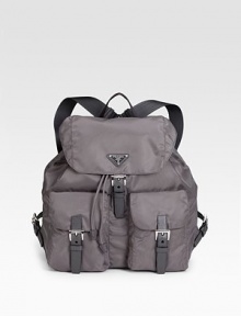 Chic nylon design with double pockets and comfortable shoulder straps.Double adjustable shoulder straps, 10-13 drop Buckle closure Two outside pockets Inside zipper Metal feet Signature jacquard lining 13W X 12H X 6D Made in Italy Chic nylon design with double pockets and comfortable shoulder straps.Double adjustable shoulder straps, 10-13 drop Buckle closure Two outside pockets Inside zipper Metal feet Signature jacquard lining 13W X 12H X 6D Made in Italy