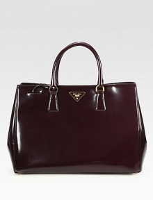 Polished leather adds elegance to this structured style.Double top handles, 5 dropMagnetic side snap gussetMagnetic snap closureProtective metal feetOne inside zip pocketThree inside open pocketsSignature jacquard lining14¾W X 10¼H X 6¾DMade in Italy Polished leather adds elegance to this structured style.Double top handles, 5 dropMagnetic side snap gussetMagnetic snap closureProtective metal feetOne inside zip pocketThree inside open pocketsSignature jacquard lining14¾W X 10¼H X 6¾DMade in Italy