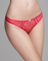 Vintage lace tulle and ribbon trim make this Cosabella thong retro-romantic.