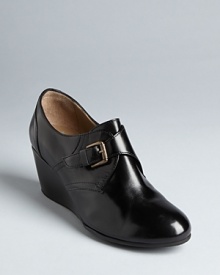 Anyi Lu brings high style into a wearable silhouette in this moderate wedge bootie design, with on-trend oxford detailing. Anyi Lu brings high style into a wearable silhouette in this moderate wedge bootie design, with on-trend oxford detailing.