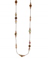 Adorned with aurora borealis crystals in rich colors, 2028's long necklace will be a chic complement to your fall wardrobe. Crafted in copper tone mixed metal. Approximate length: 42 inches.