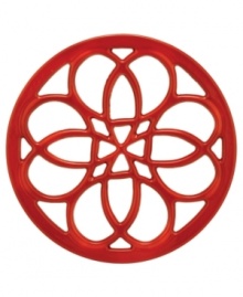This quaint cast iron trivet, a charming piece to place on any countertop or dining table, features a classic pattern that protects virtually any surface from hot pots and pans. Limited lifetime warranty. This quaint cast iron trivet, a charming piece to place on any countertop or dining table, features a classic pattern that protects virtually any surface from hot pots and pans. Limited lifetime warranty.