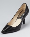 A classic shoe for the polished professional--MICHAEL Michael Kors introduces the supremely timeless MK Flex pump.