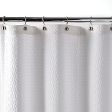 With exceptionally chic matelassé quilting, this shower curtain brings polished beauty to the bath. With exceptionally chic matelassé quilting, this shower curtain brings polished beauty to the bath.
