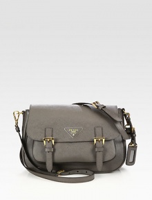 Crossbody design in textured saffiano lux leather.Detachable adjustable shoulder strap, 19-23 dropBuckled flap closureOne outside open pocketOne open pocket under flapOne inside zip pocketOne inside open pocketSignature jacquard lining11W X 8H X 3½DMade in Italy Crossbody design in textured saffiano lux leather.Detachable adjustable shoulder strap, 19-23 dropBuckled flap closureOne outside open pocketOne open pocket under flapOne inside zip pocketOne inside open pocketSignature jacquard lining11W X 8H X 3½DMade in Italy