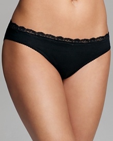 A basic low-rise bikini with pretty scalloped lace trim along waistline. A basic low-rise bikini with pretty scalloped lace trim along waistline.