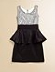 A sleeveless, slim-fitting sheath is extra charming with frilly, feminine peplum and lace overlay.ScoopneckSleevelessConcealed back zipperPeplum waistTaffeta: 49% polyester/44% polyester/7% lycraLace: polyesterDry cleanMade in USA A sleeveless, slim-fitting sheath is extra charming with frilly, feminine peplum and lace overlay.ScoopneckSleevelessConcealed back zipperPeplum waistTaffeta: 49% polyester/44% polyester/7% lycraLace: polyesterDry cleanMade in USA