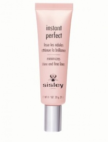 A corrective and skin enhancing product for an instant beauty boost. Instant Perfect is a siliconated gel emulsion with an ultra-soft touch, which acts instantly to erase skin imperfections and highlight the eyes. 0.7 oz. A corrective and skin enhancing product for an instant beauty boost. Instant Perfect is a siliconated gel emulsion with an ultra-soft touch, which acts instantly to erase skin imperfections and highlight the eyes. 0.7 oz.