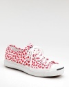 Converse collaborates with the famed Finnish design house Marimekko to create this splashy design.Lace-up front Rubber toe cap Padded insole Rubber sole Imported Sizing NoteIf you wear a woman's whole size, order one half-size down for best fit. 