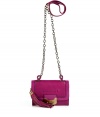 A mini version of the must-have Harper bag, this Diane von Furstenberg crossbody bag will update your cocktail-ready look - Front flap with turn-lock closure, tassel detail, shoulder strap with chain detail, back logo detail - Pair with a flirty frock and heels