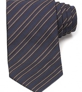 Maintain your polished appearance with this dignified silk tie, cut in a classic width for traditional appeal and patterned with a handsome stripe design.
