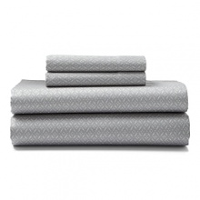 These cotton sateen sheets feature a lattice print in grey and aqua on a stone colored canvas. These cotton sateen sheets feature a lattice print in grey and aqua on a stone colored canvas.