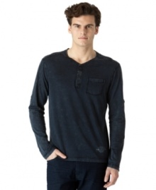 With easy henley styling, this shirt from Calvin Klein Jeans redefines your weekend wardrobe. With easy henley styling, this shirt from Calvin Klein Jeans redefines your weekend wardrobe.