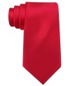 Start your day on a solid note with this sharp silk tie from Tommy Hilfiger.