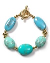 Dress up your summer whites with Lauren by Ralph Lauren's stunning turquoise stone bracelet.