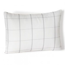 Classic style in a breezy open check, this Calvin Klein decorative pillow adds a clean, bright touch to both traditional and contemporary decor. Classic style in a breezy open check, this Calvin Klein decorative pillow adds a clean, bright touch to both traditional and contemporary decor.