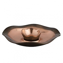 The Copper Canyon Collection was inspired by the designer's many trips to the canyons of the southwest. Grand Canyon, Arches National Park, Bryce Canyon and others. These canyons are carved from water and wind. The coppery sand and desert flora are referenced by the copper and verdigris on the ripples and ridges of Nambé's Copper Canyon Collection. The Copper Canyon Collection was inspired by the designer's many trips to the canyons of the southwest. Grand Canyon, Arches National Park, Bryce Canyon and others. These canyons are carved from water and wind. The coppery sand and desert flora are referenced by the copper and verdigris on the ripples and ridges of Nambé's Copper Canyon Collection.