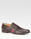 Fine leather with signature web detail. Green/red/green web Rubber sole Made in Italy 